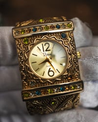 Image 2 of Golden ornate watch