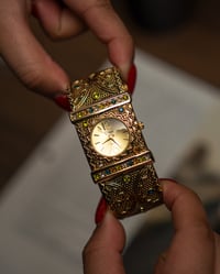 Image 1 of Golden ornate watch