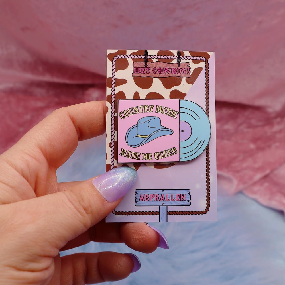 Image of Country Music Made Me Queer Enamel Pin. Abprallen x Hey Cowboy