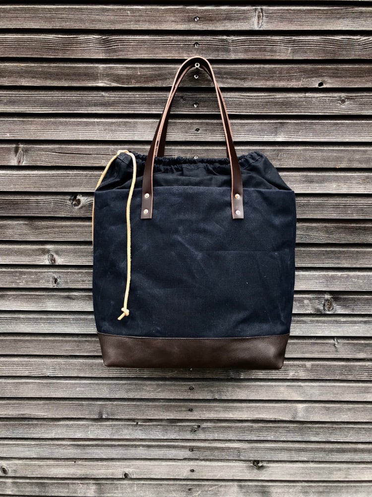 Image of Draw string closure large tote bag in black waxed canvas