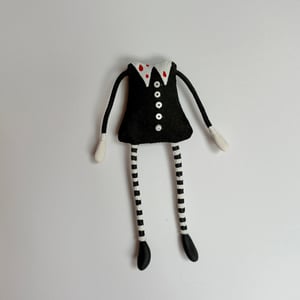 Image of Wednesday Addams' Headless Doll #1