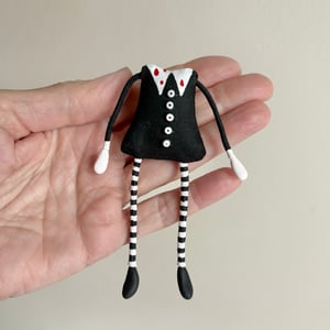 Image of Wednesday Addams' Headless Doll #1