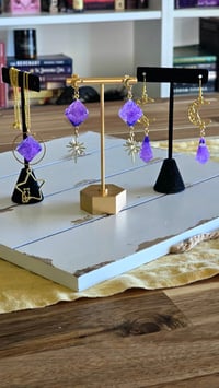 Image 1 of Wizard of Waterdeep dice jewelry 