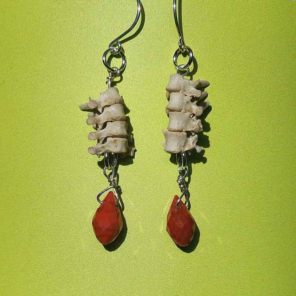 Image of silver squirrel vertebrae earrings