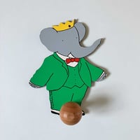 Image 1 of Patère bois Babar seconde main années 90