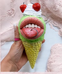 Image 1 of Ice Cream Mouth Tongue Out Piercing