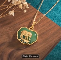 Green emerald necklace w/elephant
