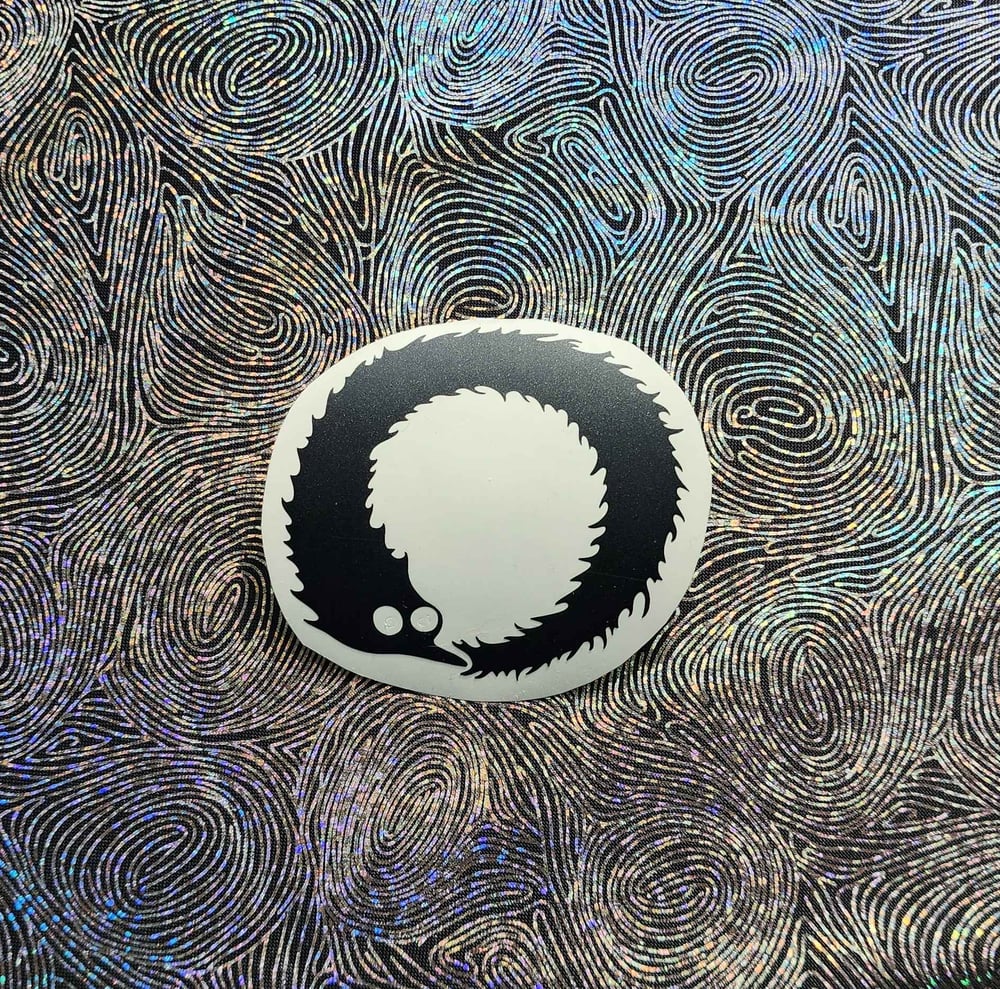 Image of worm on a string sticker