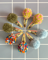 Image 2 of pom pom hair clips