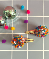 Image 1 of pom pom hair clips