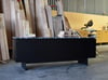 ZOE SIDEBOARD IN TORCHED TASMANIAN OAK AND GRANITE