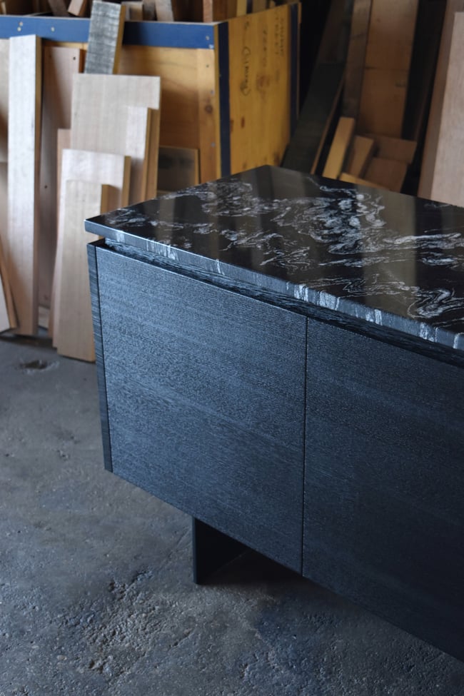 ZOE SIDEBOARD IN TORCHED TASMANIAN OAK AND GRANITE