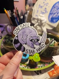 Stay Safe Stab Hard Raccoon Sticker