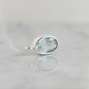 Image of  Aquamarine oval cut crystal form silver necklace