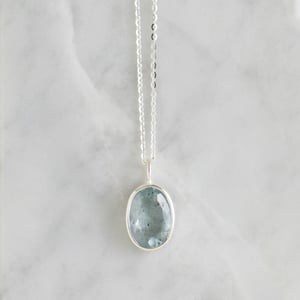 Image of  Aquamarine oval cut crystal form silver necklace