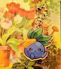 Image 2 of Pancake Oddish Acrylic Keychain