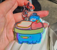 Image 3 of 'Tad Cafe Holographic Acrylic Keychain