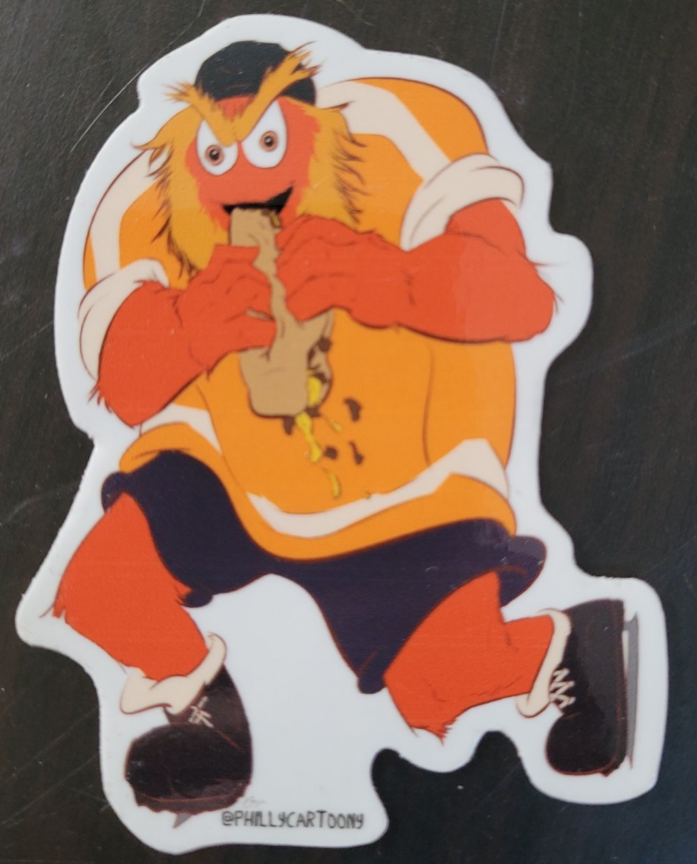 Gritty Devouring His Steak