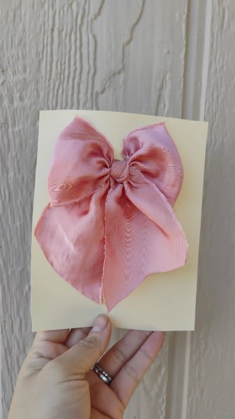 Image of Coral clip silky bow