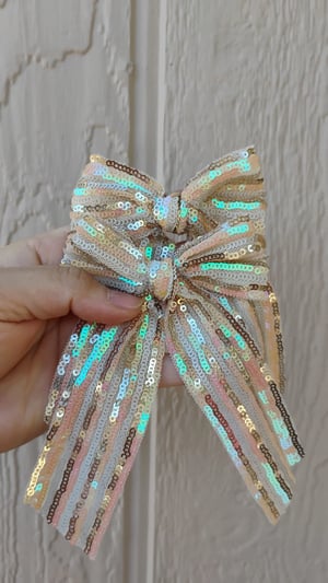 Image of Sequin clip bow 