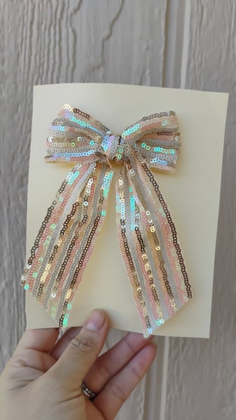 Image of Sequin clip bow 