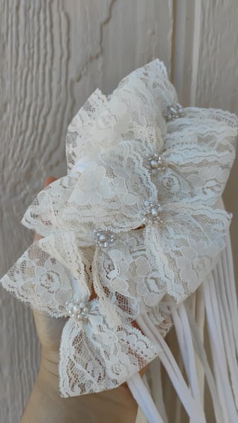 Image of Off white lace bows