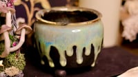 Image 1 of Small Matte Black Footed Ceramic Bowl with Jade Green Glaze