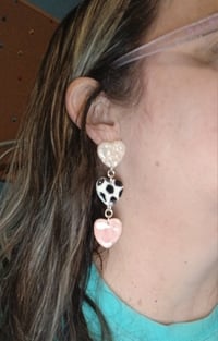3 heart cowprint earrings 