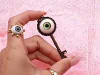 Image 2 of Key pendant with eye, from ALICE in Wonderland