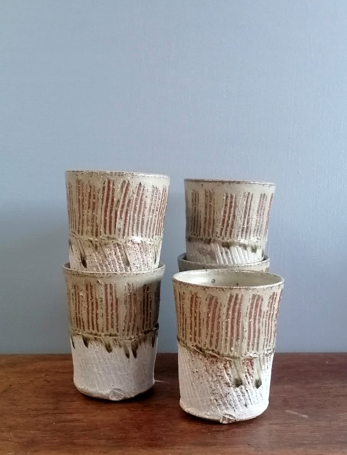 Image of Textured and part ash glazed Beakers 