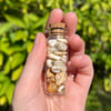 Altered Pebbles: Agates vial