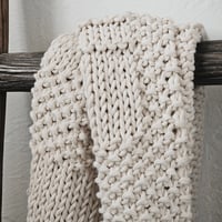 Image 4 of Amber hand knit cotton towel, made with recycled Argentinian cotton yarn. Handy corner loop to hang