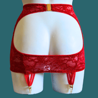 Image 1 of The AMORE overt suspender skirt in berry red lace