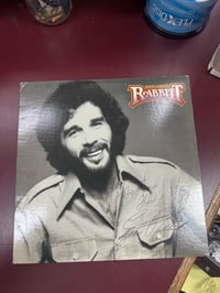 Image 1 of Signed Eddie Rabbitt vinyl (vinyl in bad shape! Sold as is) 