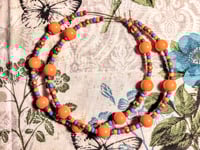 Image 9 of Daisy Orange, Ocean Blue, Red, and Gold Multicolor Beaded Extra Large Hoop Earrings