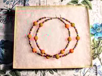 Image 7 of Daisy Orange, Ocean Blue, Red, and Gold Multicolor Beaded Extra Large Hoop Earrings