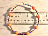 Image 2 of Daisy Orange, Ocean Blue, Red, and Gold Multicolor Beaded Extra Large Hoop Earrings