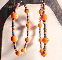Image 1 of Daisy Orange, Ocean Blue, Red, and Gold Multicolor Beaded Extra Large Hoop Earrings