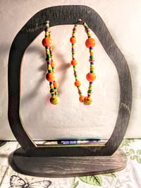 Image 6 of Daisy Orange, Leaf Green, Purple, and Copper Multicolor Beaded Extra Large Hoop Earrings