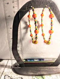 Image 5 of Daisy Orange, Leaf Green, Purple, and Copper Multicolor Beaded Extra Large Hoop Earrings