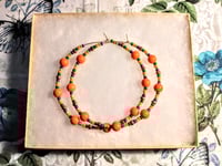 Image 7 of Daisy Orange, Leaf Green, Purple, and Copper Multicolor Beaded Extra Large Hoop Earrings