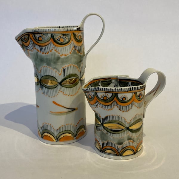 Image of Orange and gold pattern jugs