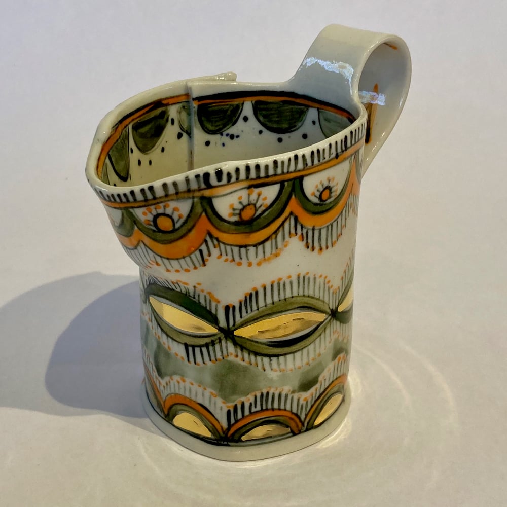 Image of Orange and gold pattern jugs
