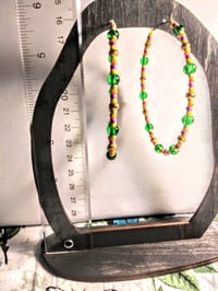 Image 5 of Leaf Green, Yellow, Purple, Orange, and Copper Multicolor Beaded Extra Large Hoop Earrings