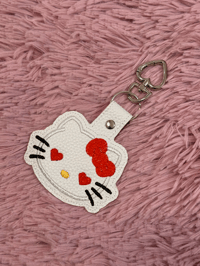 Image 2 of red hello kitty keychain