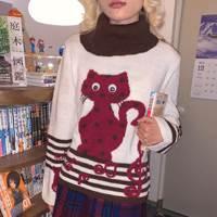 Image 1 of Dizzy Cat Music Note Sweater with Movable Eyes
