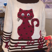 Image 2 of Dizzy Cat Music Note Sweater with Movable Eyes