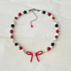 red bow necklace