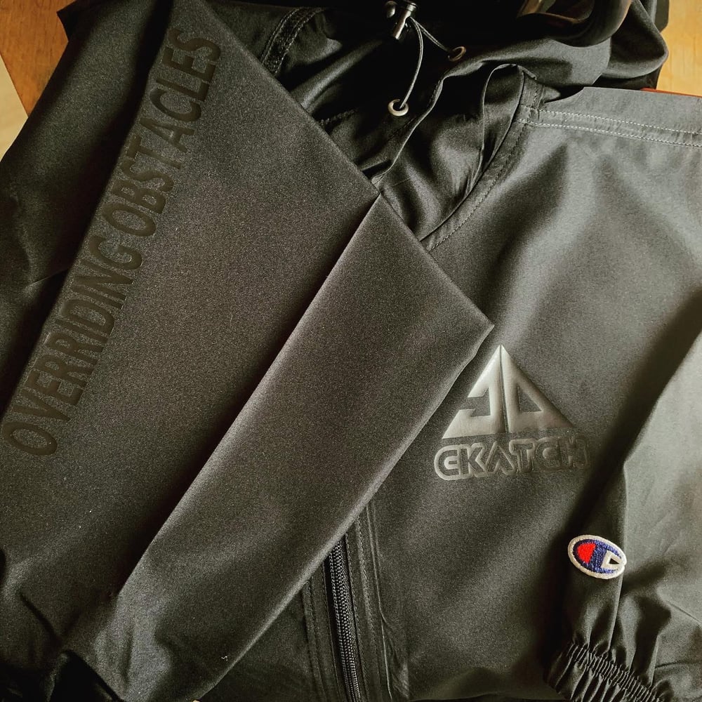 Image of Black on Black CKATCH x Champion Unisex Packable Anorak 1/4 Zip Jacket