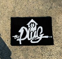 Image 1 of The Plug Rug 